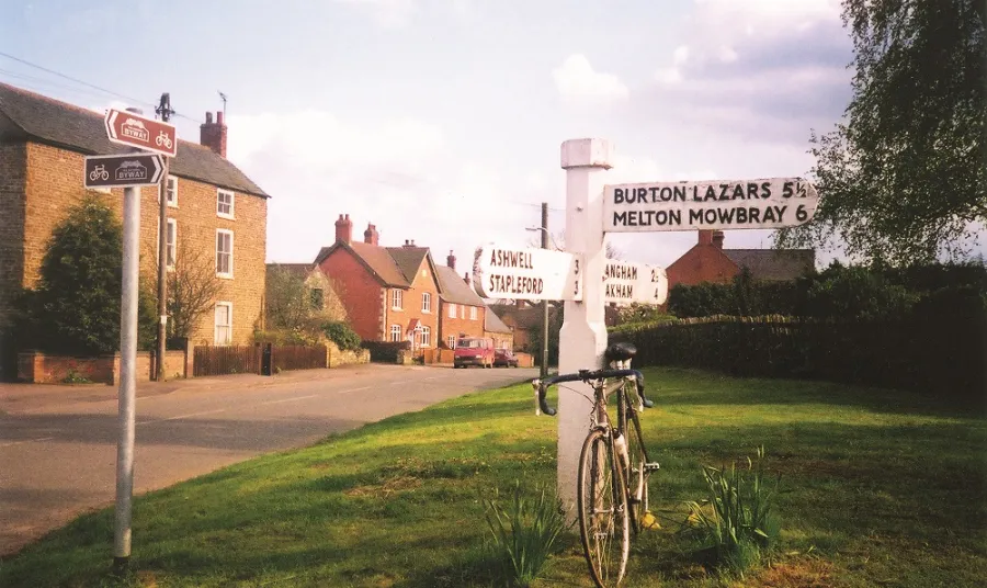 A bicycle and sign on the National Byway
