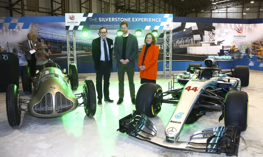 Prince Harry turns the start lights green with HLF's Sir Peter Luff and Silverstone's Sally Reynolds