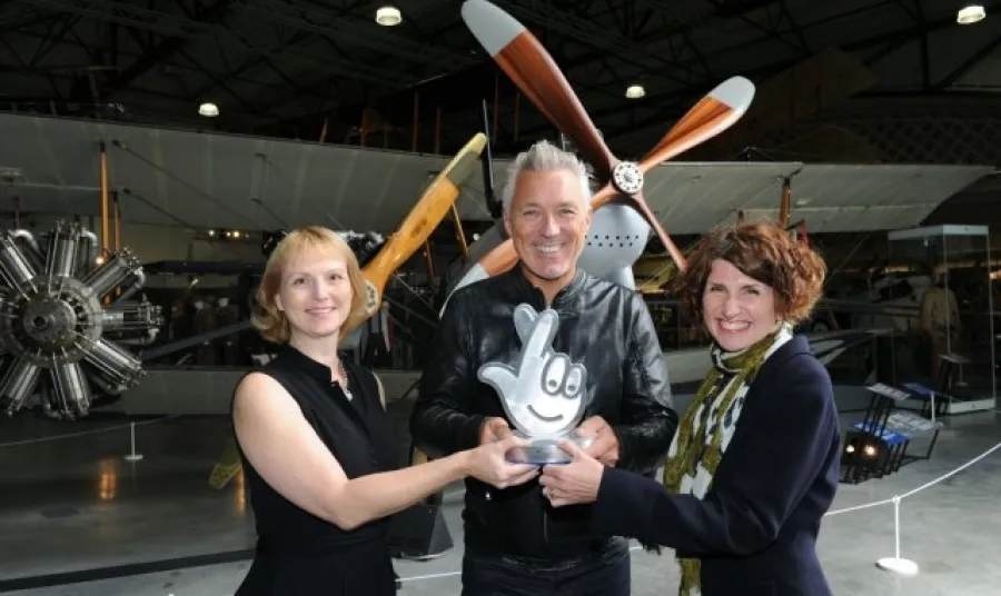 Martin Kemp presents the National Lottery Award to Karen Whitting of the RAF Museum