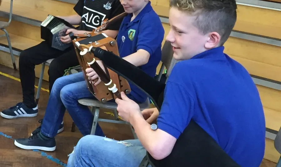 Young people playing traditional music