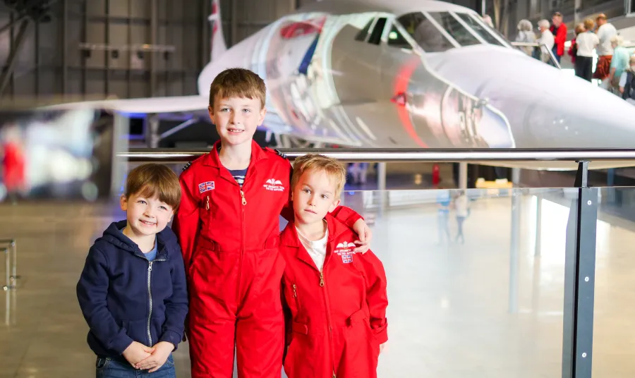 Children standing in front of Concorde