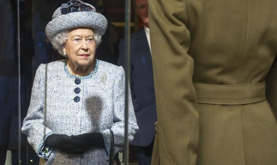 Her Majesty the Queen views her uniform, worn as an Honorary Brigadier in the Women's Royal Army Corps, in the National Army Museum