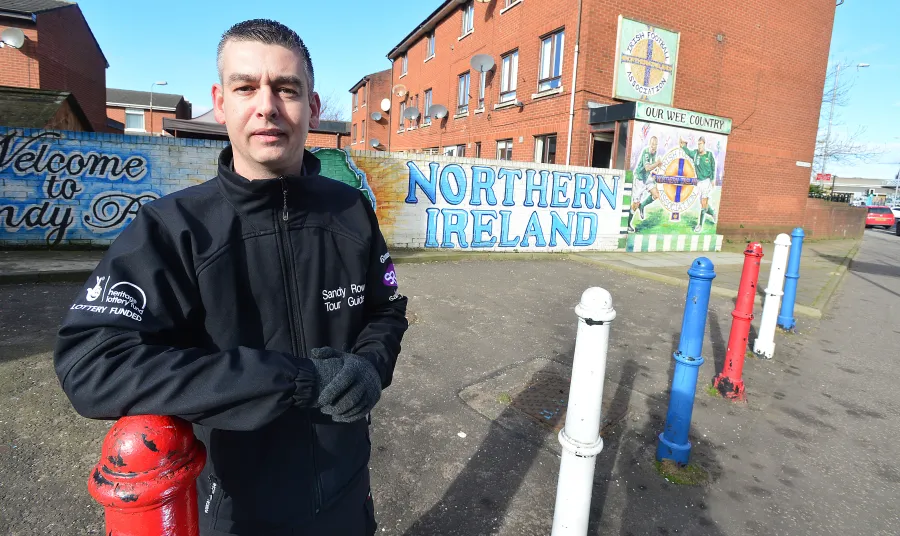 Tour guide Paul McCann on Sandy Row in Belfast