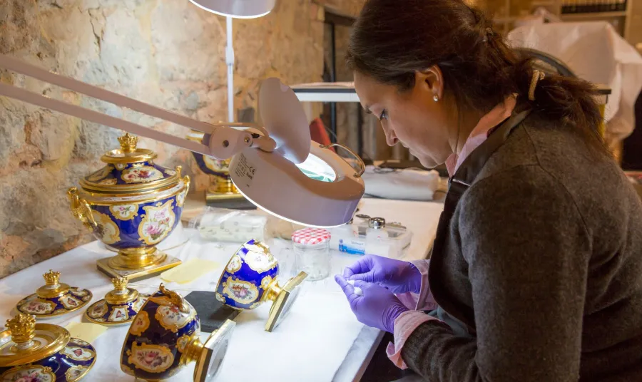 Conservationist at work in Knole's conservation studio 