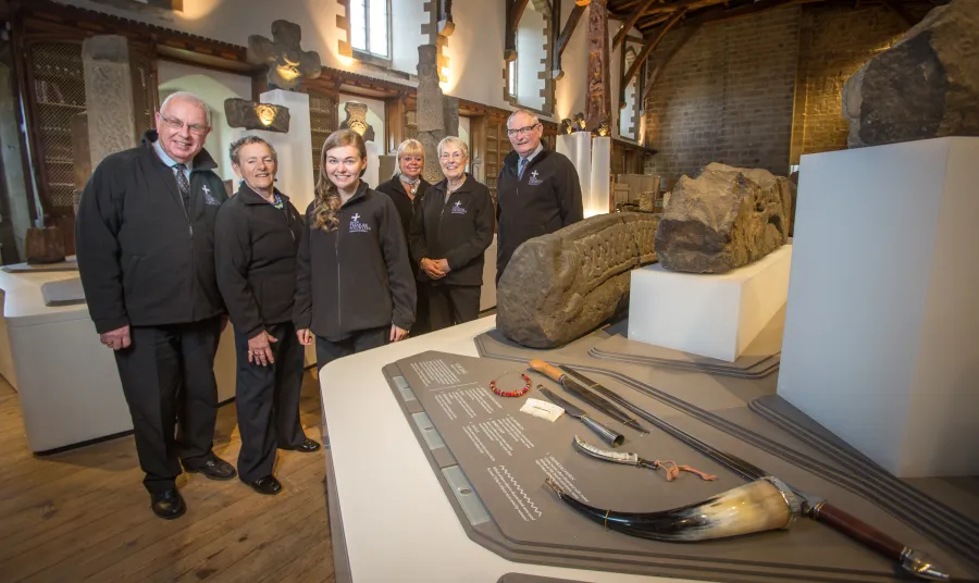 Volunteers and staff in the Monk's Dormitory