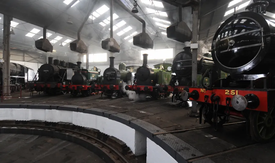 Locomotives line up inside the Barrow Hill Roundhouse