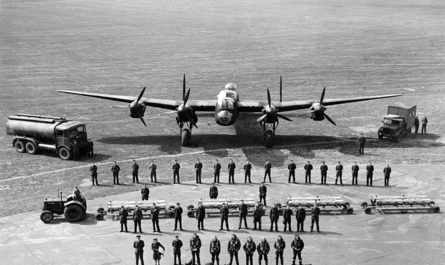 Units from Bomber Command line up in front of a Lancaster Bomber