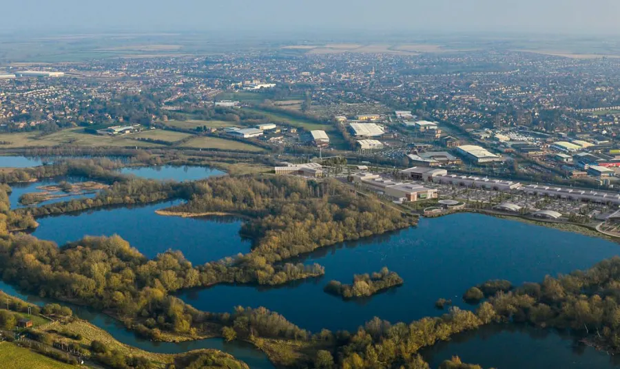 A visual of Skew Bridge Lake with the planned retail and visitor centre in the background