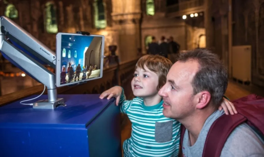 Adult and child at a museum