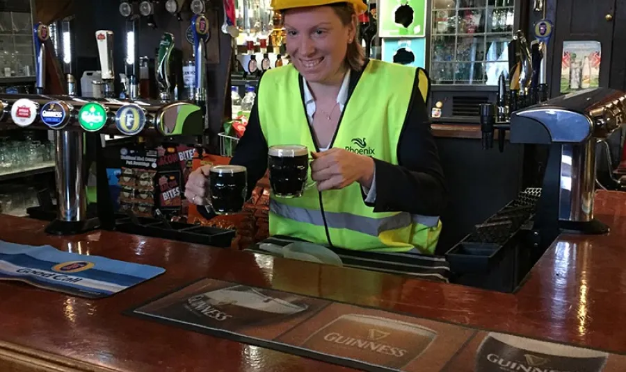 Heritage Minister Tracey Crouch pulling pints at The Fellowship Inn, Bellingham, South London