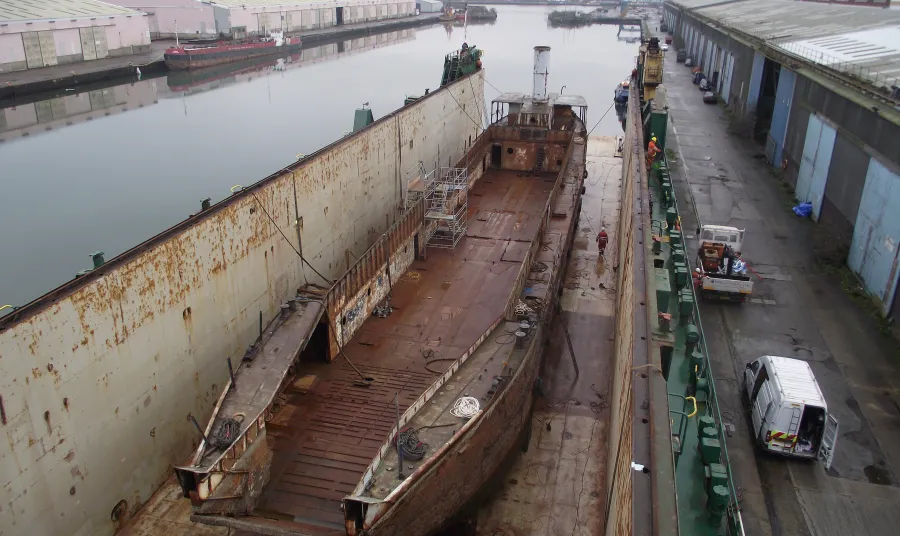 LCT 7074 being relocated to Portsmouth