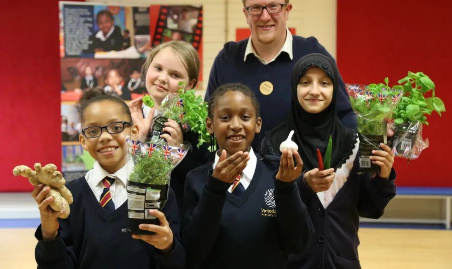 Nick Clitheroe with founding members of Spice Academy