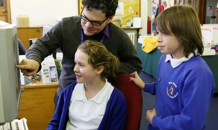 Water Street Primary students working with Library staff to conduct research into ex-students killed during the war