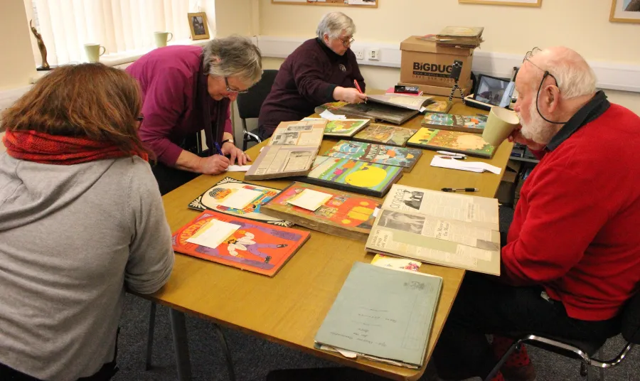 Participants logging archive materials
