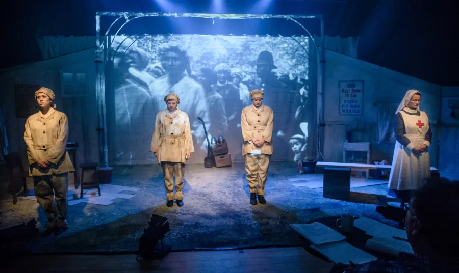 Actors performing 'Gas Girls'