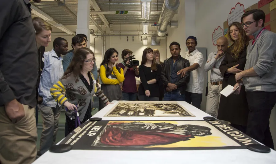 Participants discussing one of the exhibition items