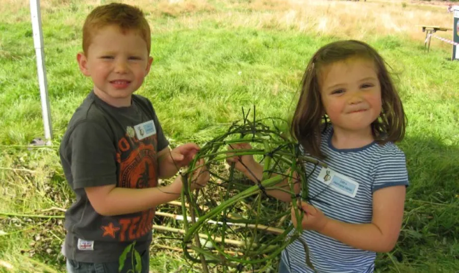 Staffordshire Wildlife Trust Children making willow sculputes, part of the Celebrating Our Heathland heritage project