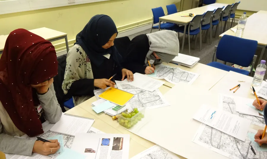 Young participants creating a walking trail