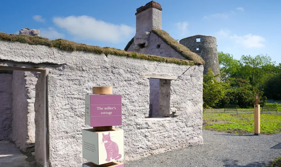 New interpretation panels are in front of the preserved buildings
