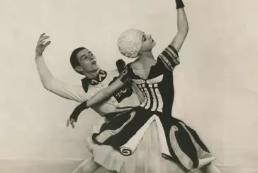 Black-and-white studio photo of two ballet dancers