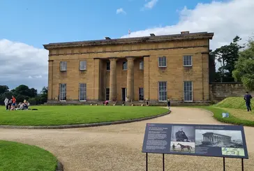 Belsay Hall Belsay Hall with people sat on the lawn in front