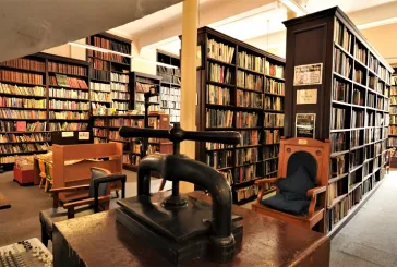Shelves lined with books inside the Linen Hall Library