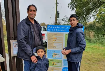 Family stood outside at a Nene Park event