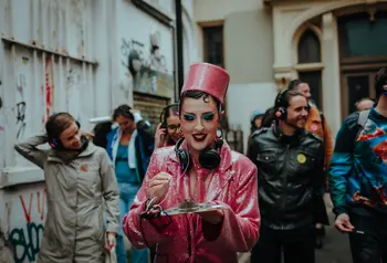 People taking part in an audio heritage tour in Brighton