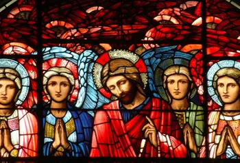 Detail from a Burne-Jones stained glass window at Birmingham Cathedral showing figures