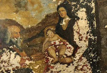 A damaged wall painting showing a biblical scene of the Virgin Mary and infant Christ