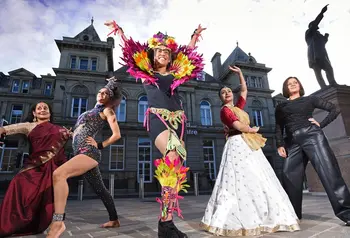 Five dancers strike a pose outside Bradford Arts Centre.