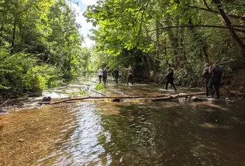 Community exploring the River Roding at Wanstead Park, Redbridge.