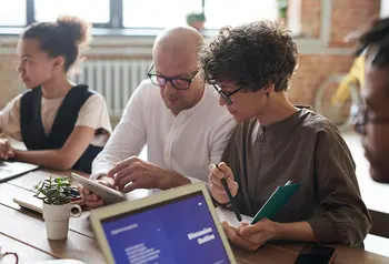 People meeting using computer and tablet