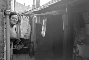 Historic photo of woman in street