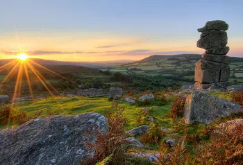 Sun setting at the iconic Bowerman's Nose in Dartmoor