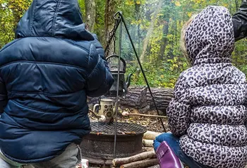 Children toasting marshmallows at a woodland storytelling festival