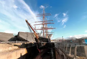 The tall ship RRS Discovery stands in dry dock neighbouring Dundee's branch of the Victoria and Albert Museum.