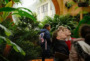 School children visit the greenhouses at Birmingham Botanic Garden