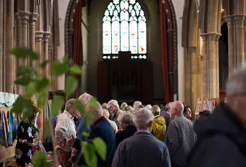 People look at stalls at a craft fair inside St Peter's Sudbury