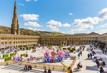 People enjoying an event in the courtyard of The Piece Hall