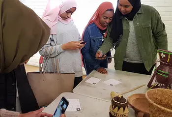 Women looking at exhibits