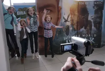 Children jump in front of a video camera