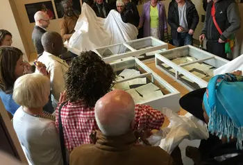 Participants looking at objects as part of the Great War to Race Riots