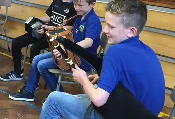 Young people playing traditional music
