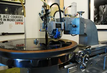 A vinyl record being cut
