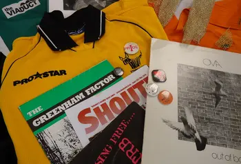 Archive materials including magazines, clothes and badges