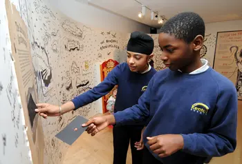 Schoolchildren enjoying the Seven Stories exhibition