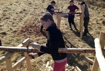 Young people making peat spade handles for the Talking Turf project