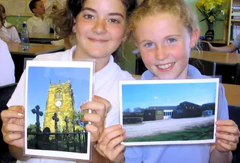 Children sharing photographs of Beighton