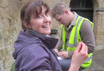 Volunteer with archaeological find at Abberley dig